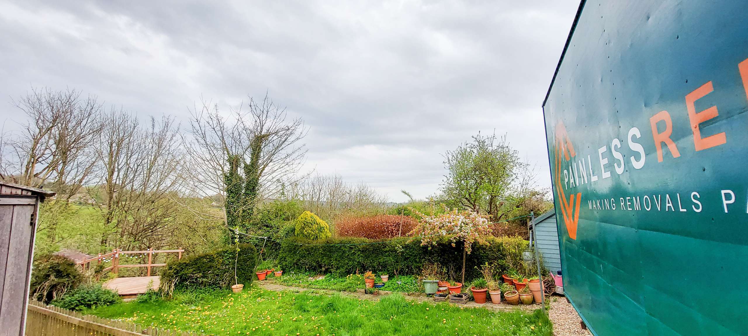 Painless Removals van at a countryside home in Horsley, Gloucestershire