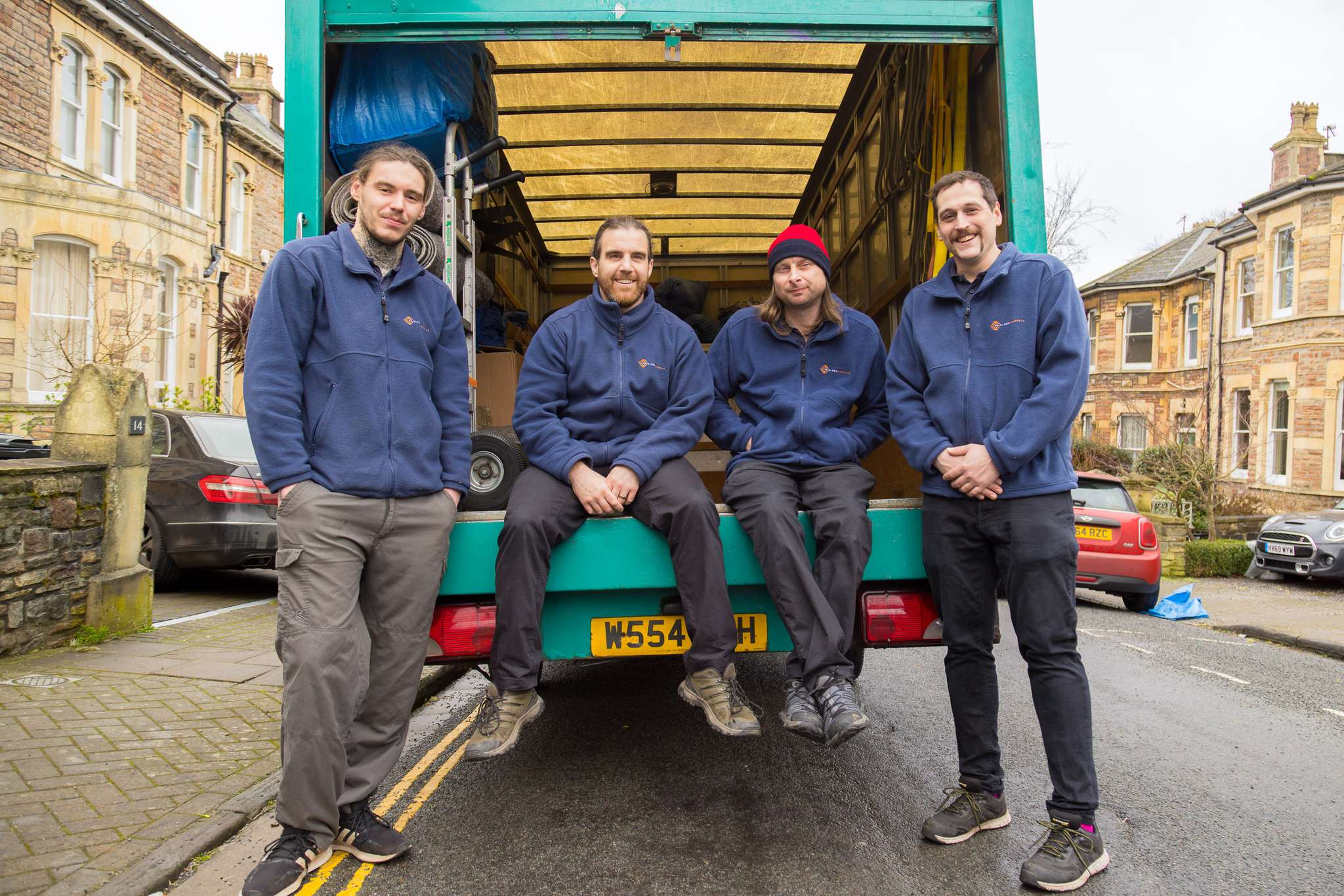 Removal crew loading furniture for a long-distance move to Exeter
