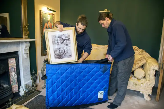Painless Removals crew loading a van in Bristol