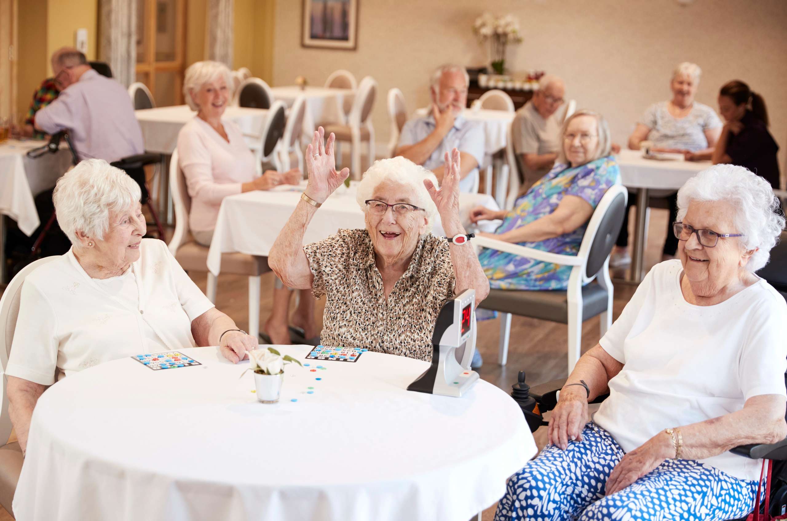 Older residents in the dining room of a Bristol care home — Painless Removals helps clients move into and between care homes, nursing homes, and supported-living schemes.