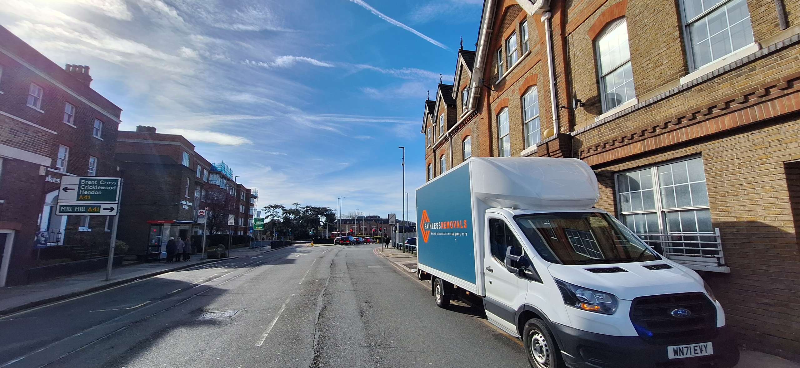 Painless Removals van on a London street near Brent Cross during a Bristol to London house move